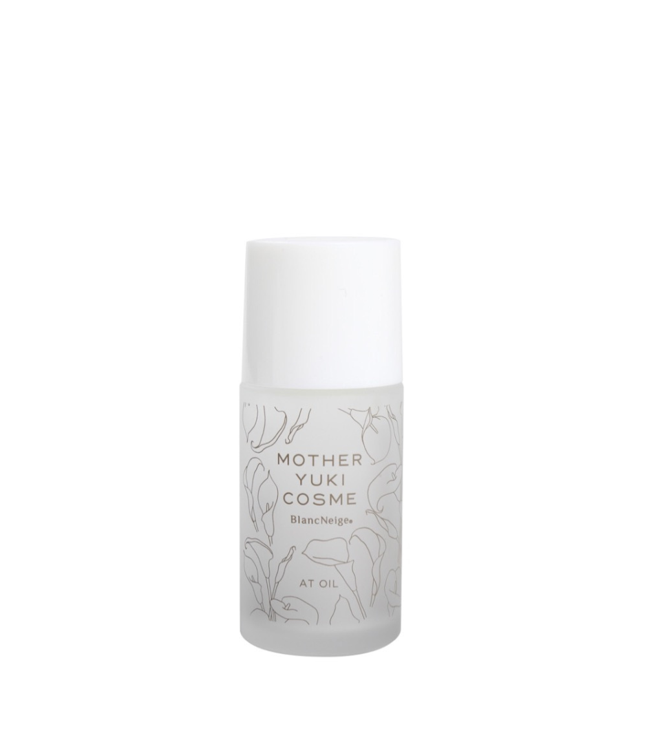 AT Oil made by Blancskincare, a Japanese skincare brand featuring natural ingredients and purified water from Japan. The product image shows a translucent white bottle with a minimal, botanical-inspired label design.